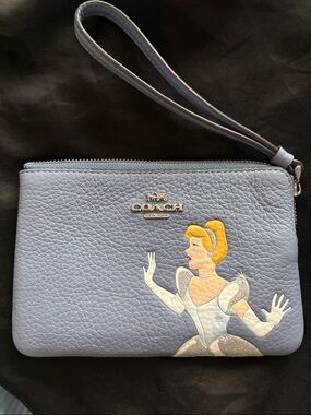 DISNEY X COACH Lavender Pebbled Leather Wristlet with Cinderella Motif
